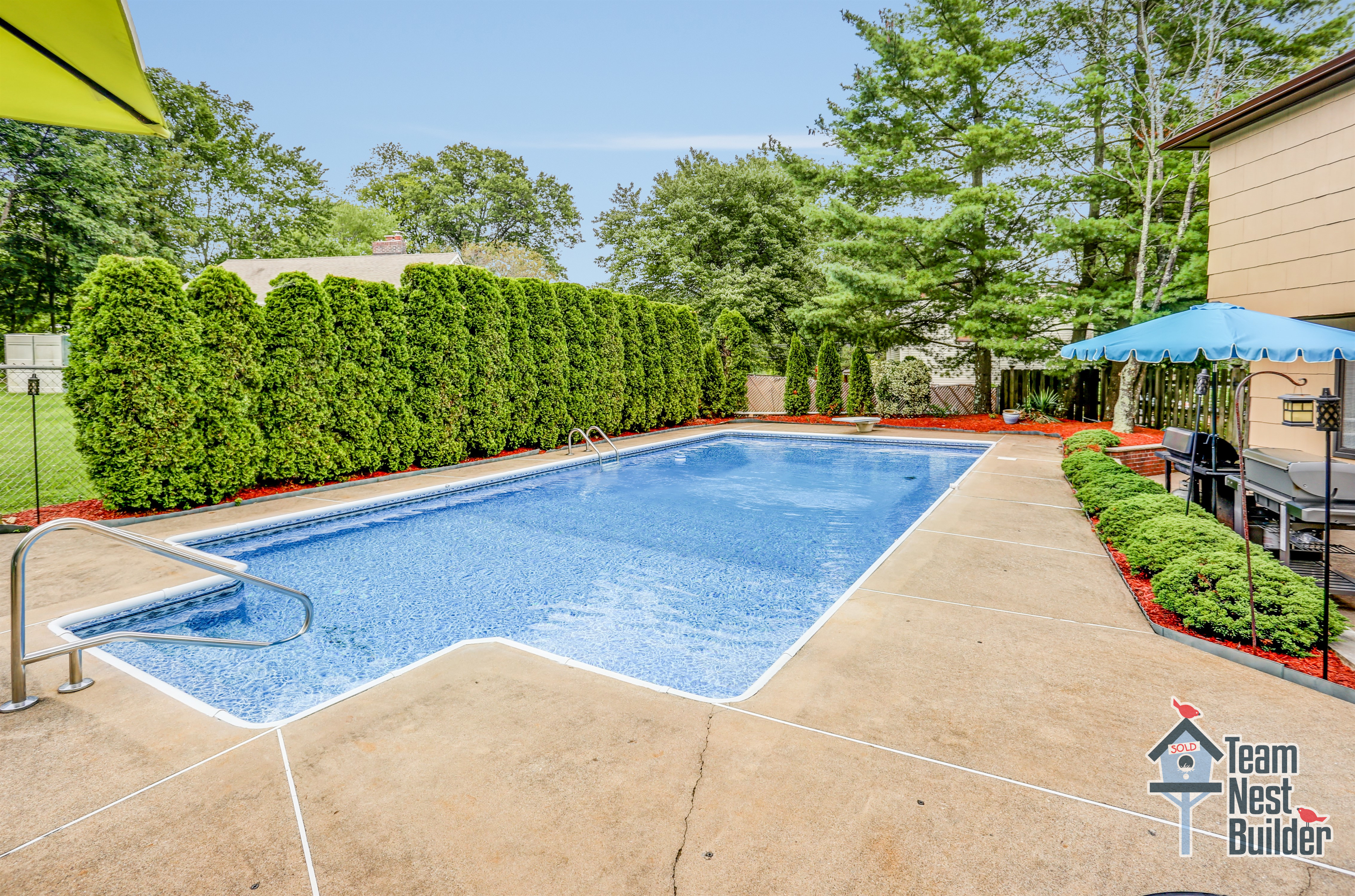 Beautifully landscaped pool area Beautifully landscaped pool area