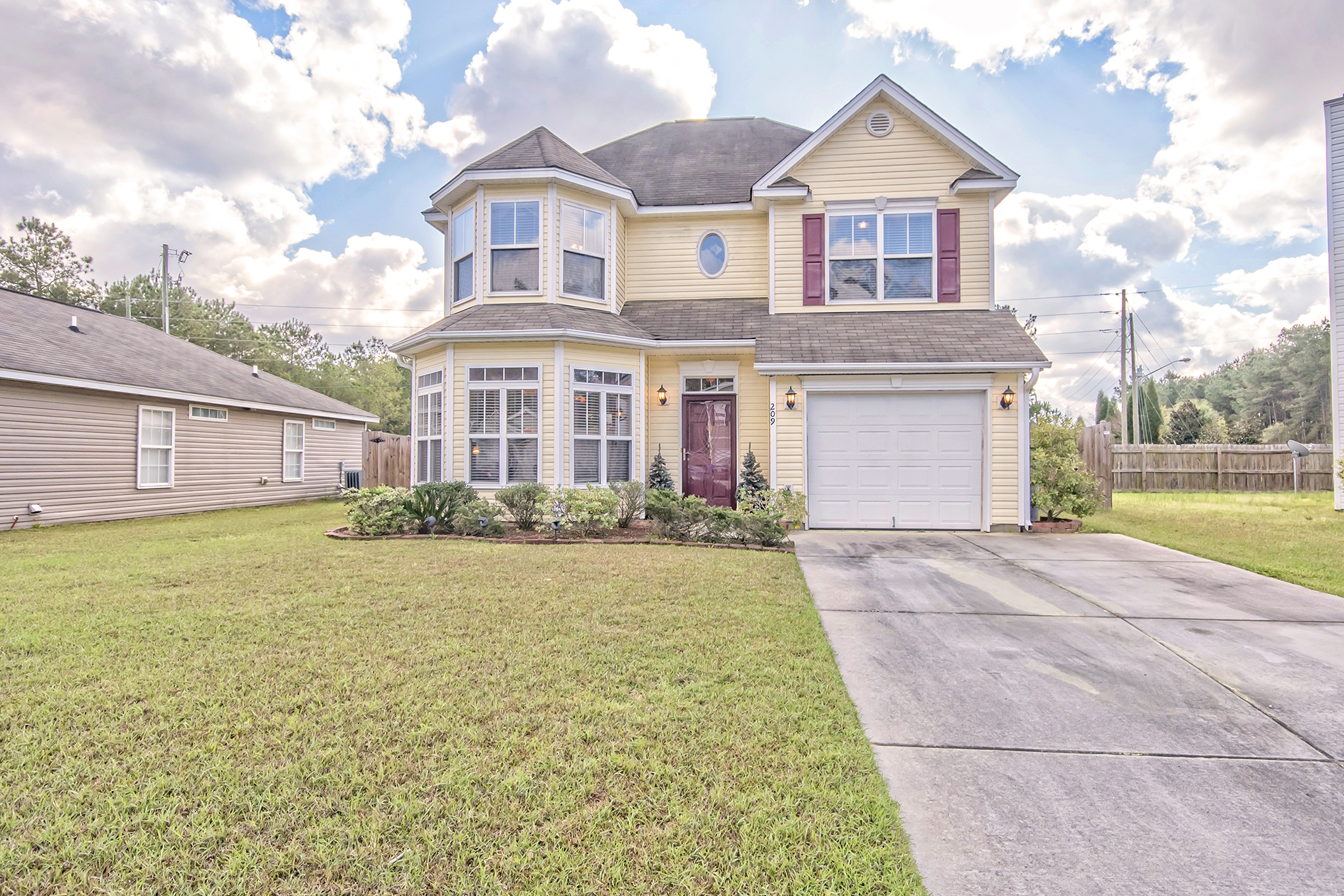 Summerville Colonial In Sangaree With Open Concept And