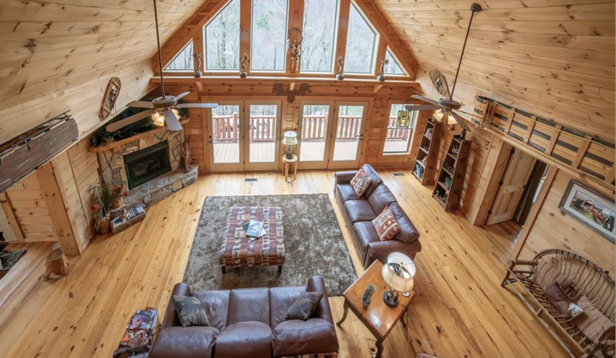 large family room beside patio with tile floors and wide table