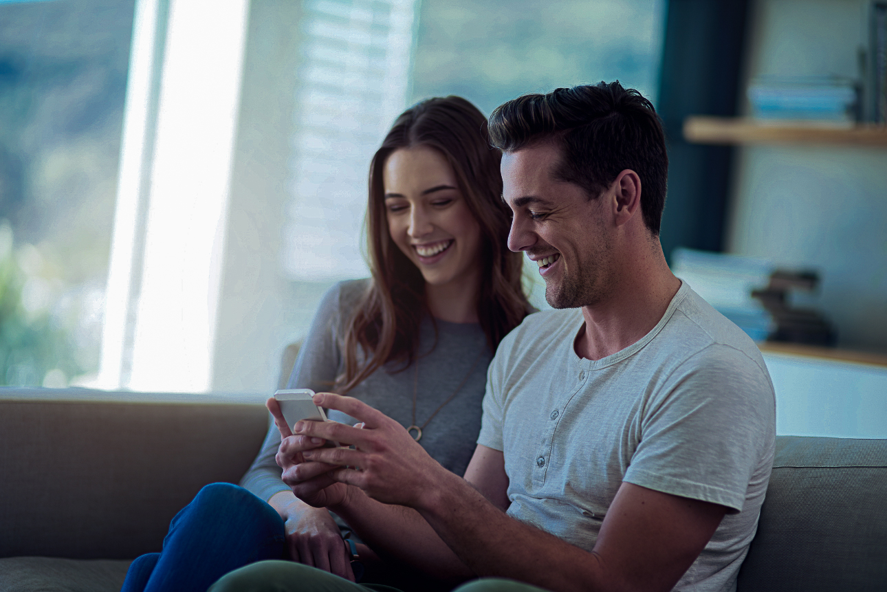 couple looking at laptop computer