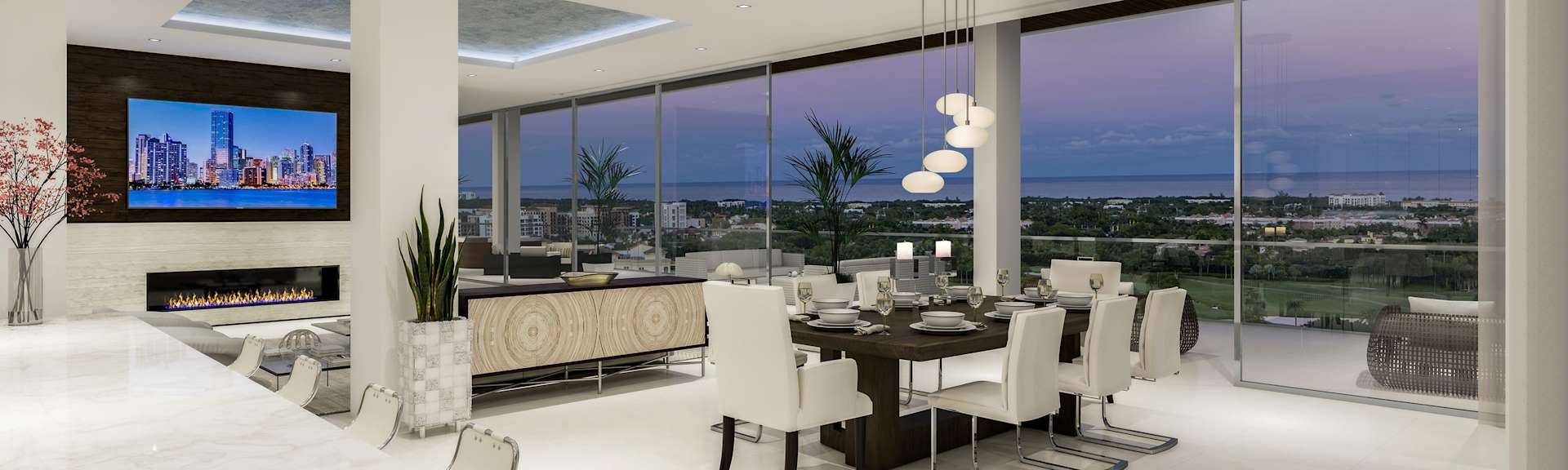 large kitchen with sitting stools and overhead lamps