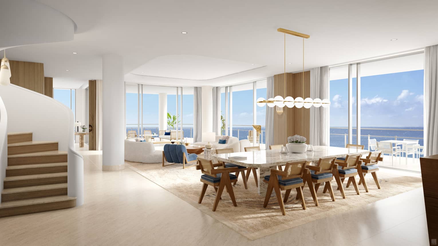 large kitchen with sitting stools and overhead lamps