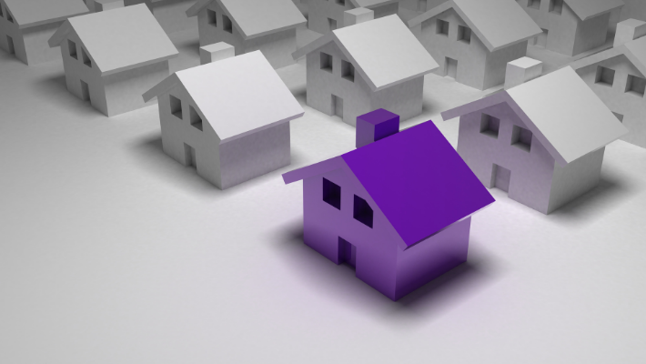 graphic of hand holding miniature house