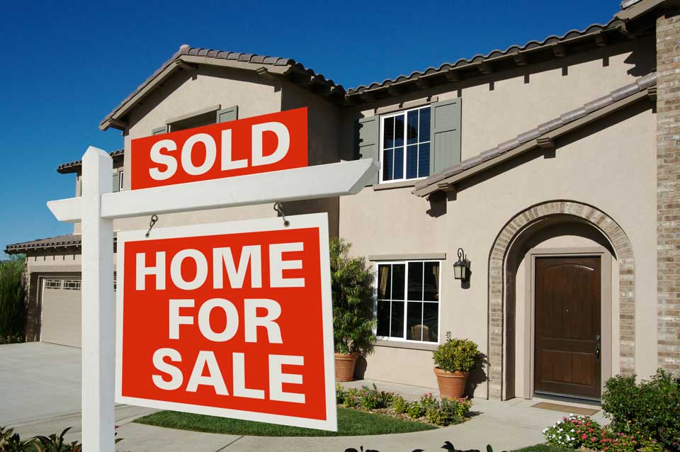 home with sold sign