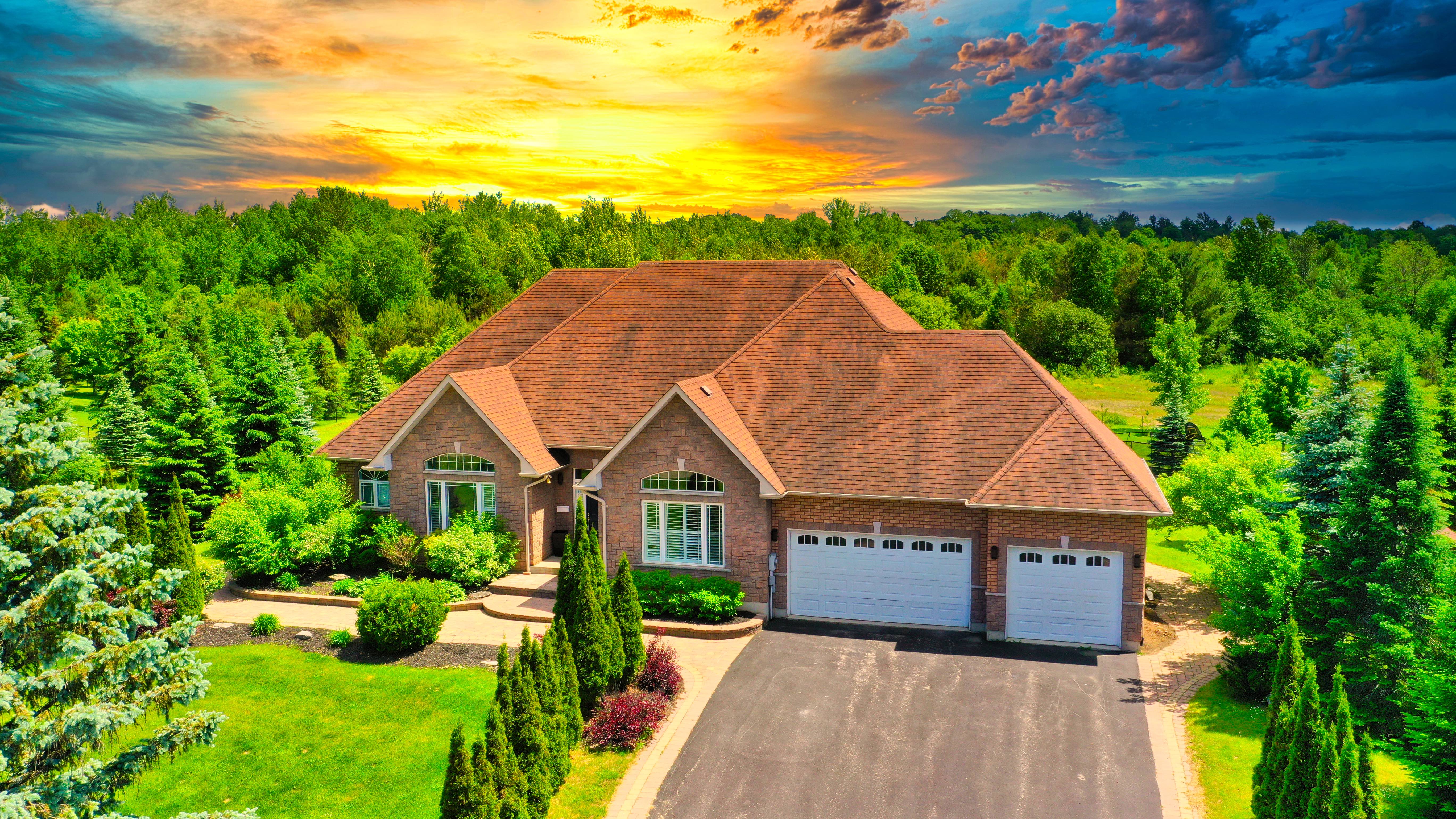 graphic of hand holding miniature house