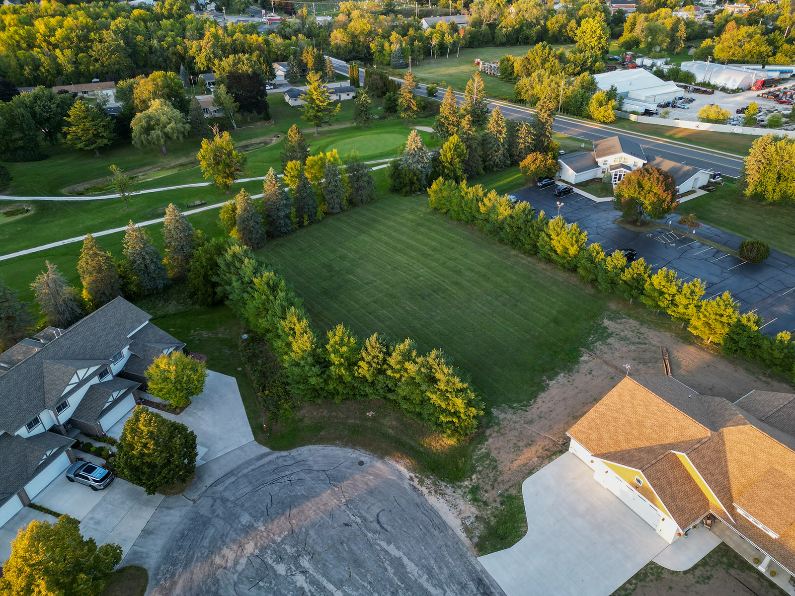 open plot of land beside road