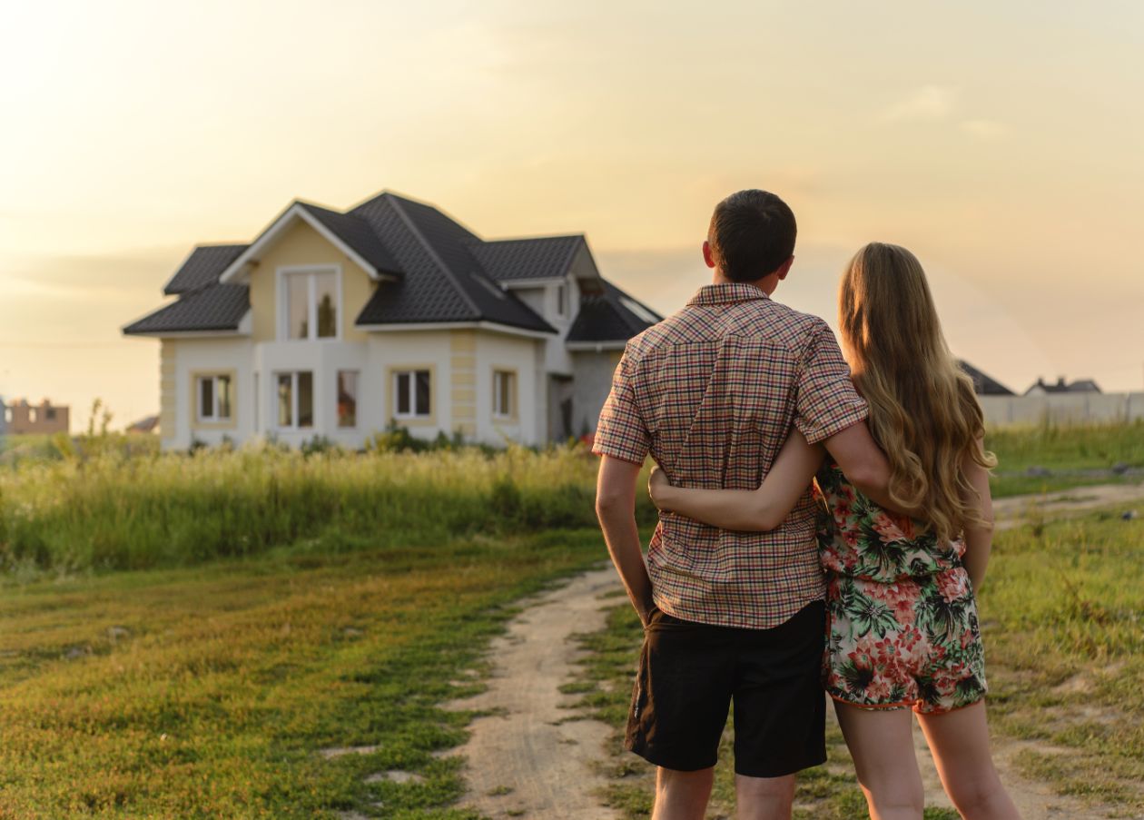 graphic of hand holding miniature house