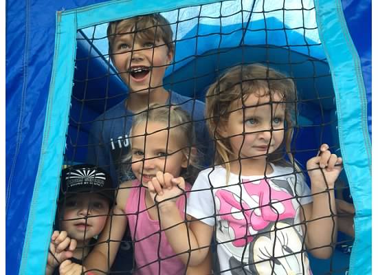 Happy kids bouncing in Carlsbad CA